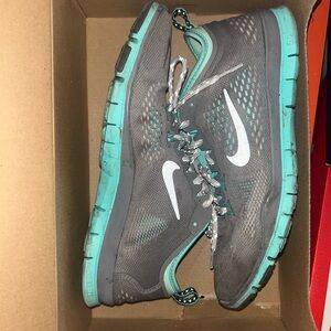 Gray and blue Nike sneakers